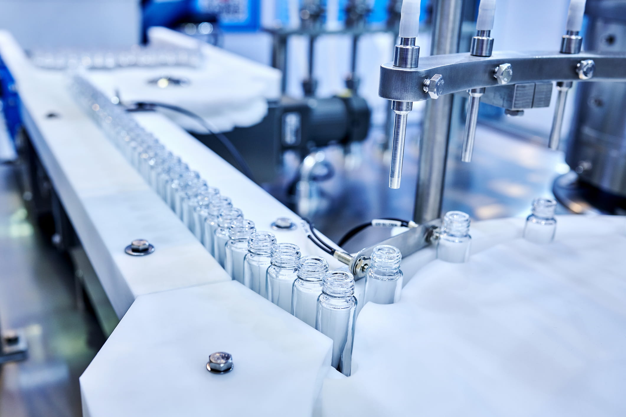 Automated production line filling small glass vials