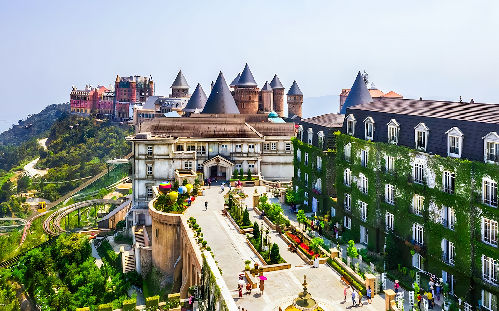 Sun World Ba Na Hills castle-like buildings and gardens with cable car in Da Nang, Vietnam.