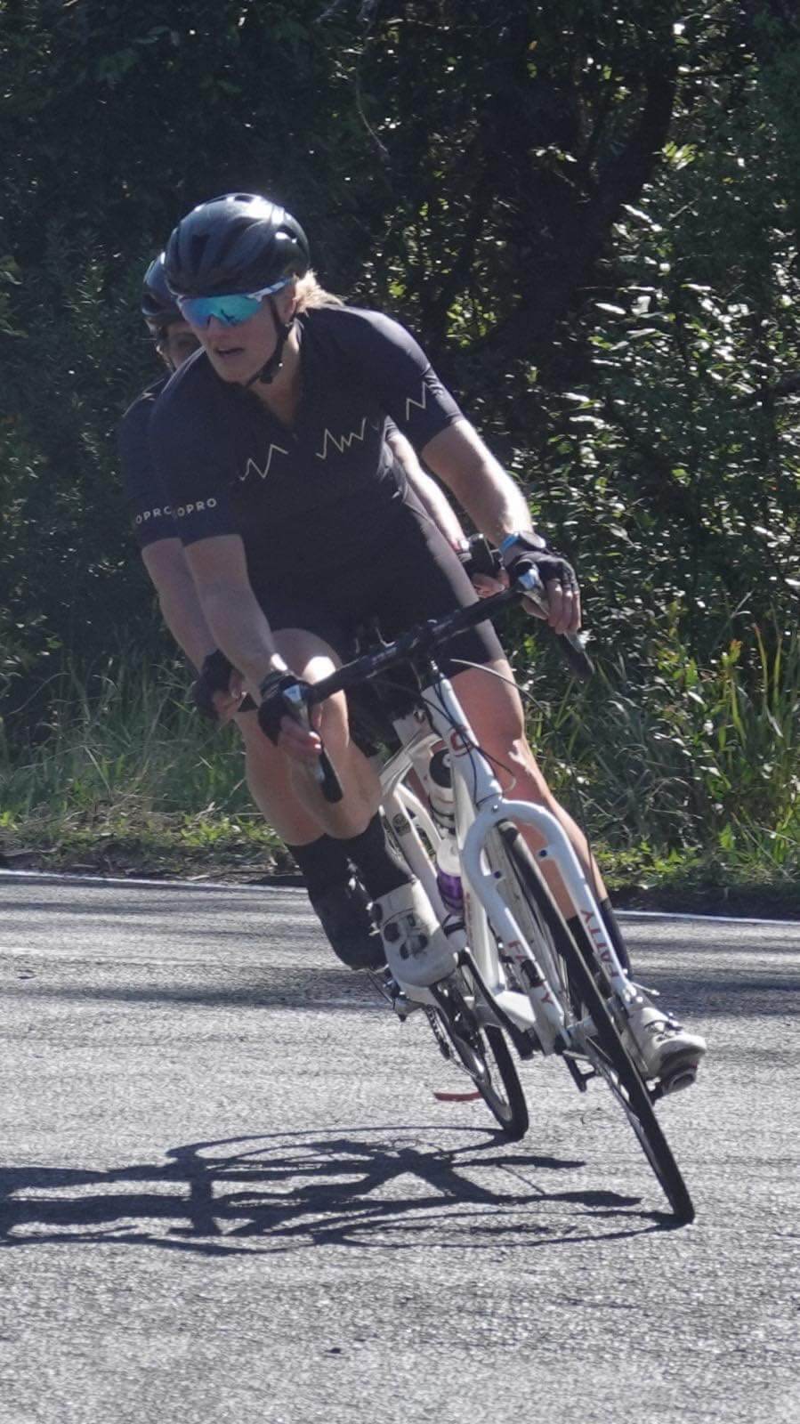 Action shot of Lily and Jay racing at an Illawarra Cycle Club event