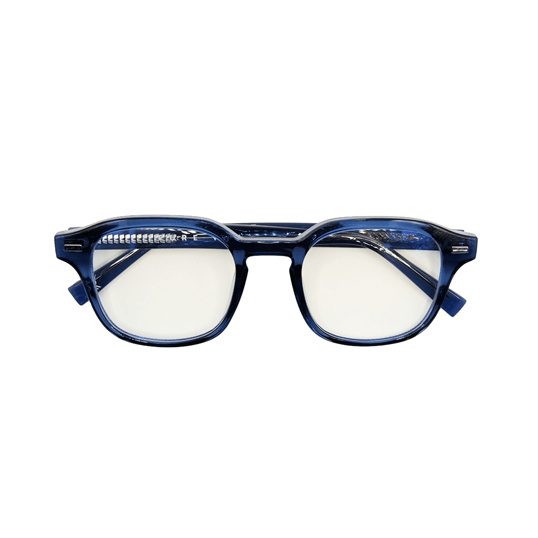 Black cosmetic product bottle against a dark background