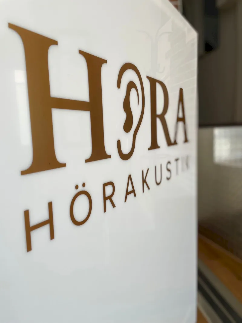 black flat screen tv on brown wooden table