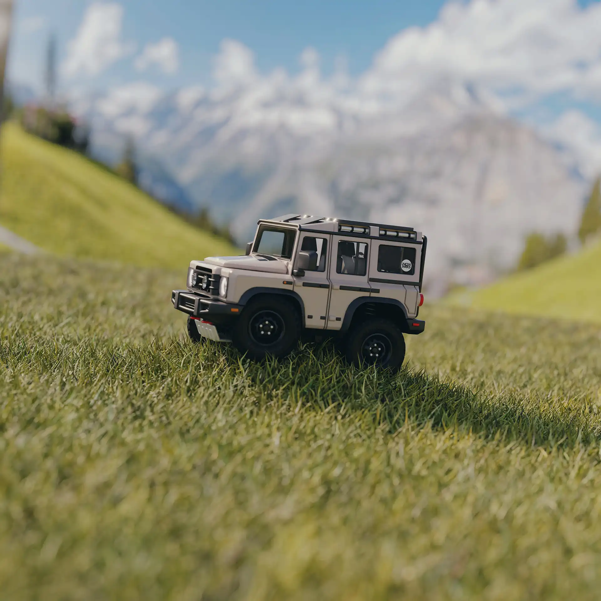 A digital rendering of a gray off-road truck in a grassy field, with mountains in the background.