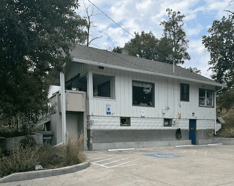 Soft white fabric folds with gentle texture.