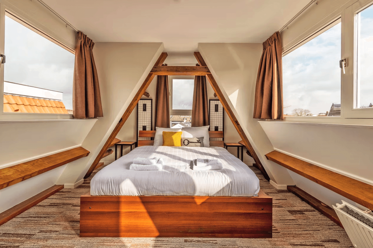 a living room with two recliners and a sink