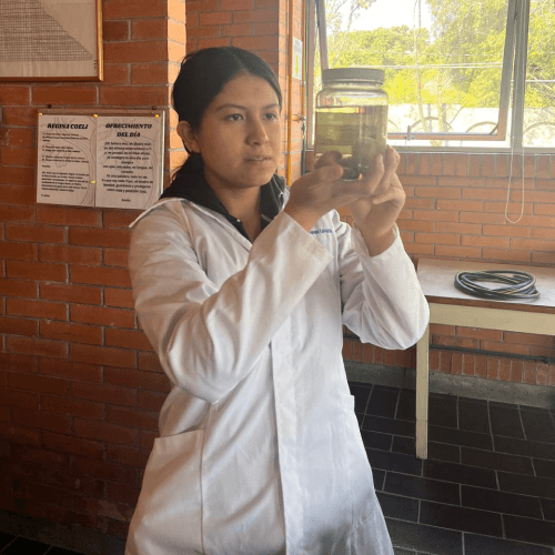 Miriam Puente Cavazos conducting science experiment in laboratory