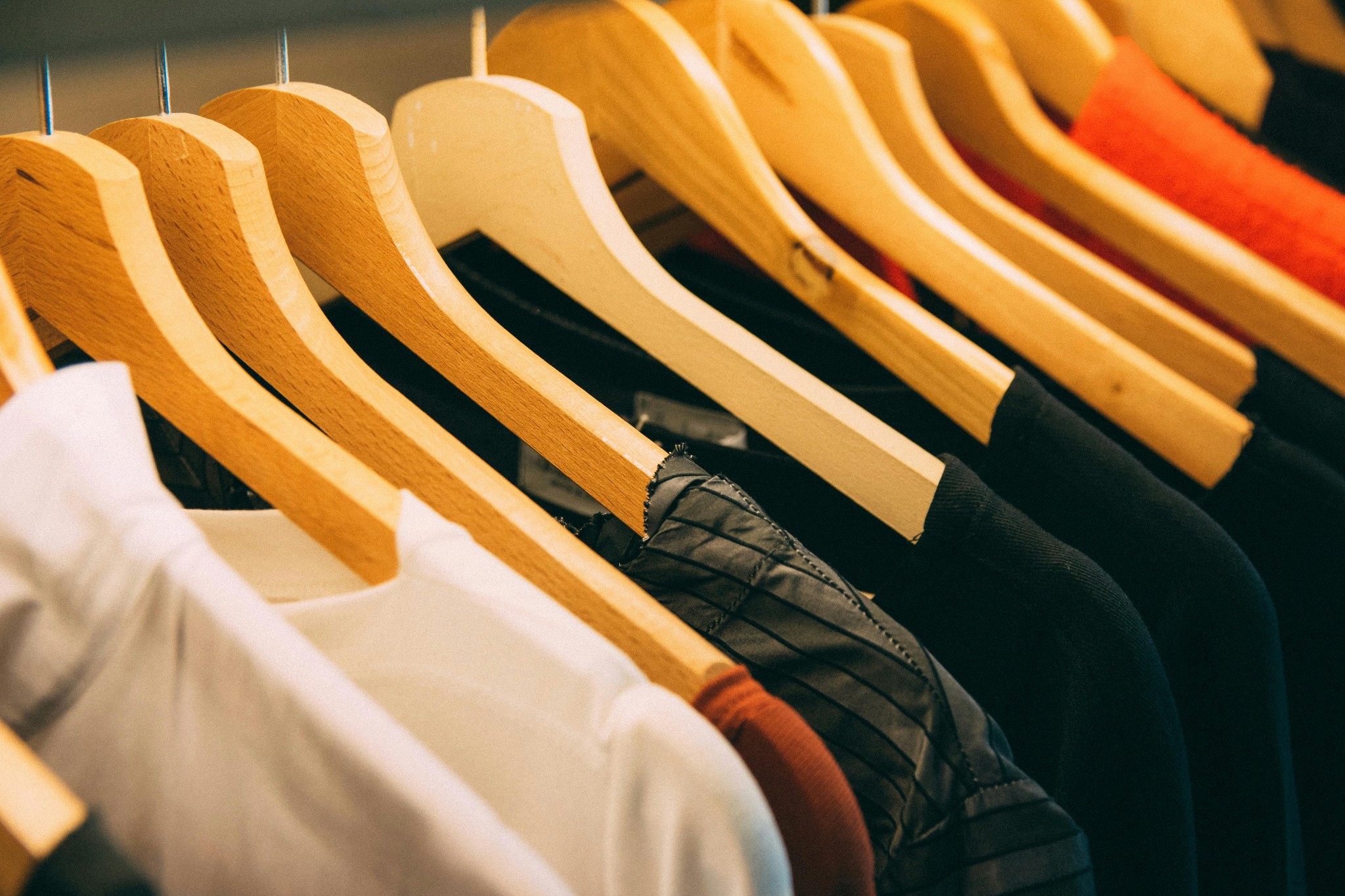 Explore trendy and affordable clothing options on wooden hangers, perfect for your style and budget. Shop returns and overstock apparel exclusively at City Bins for unbeatable deals and quality.