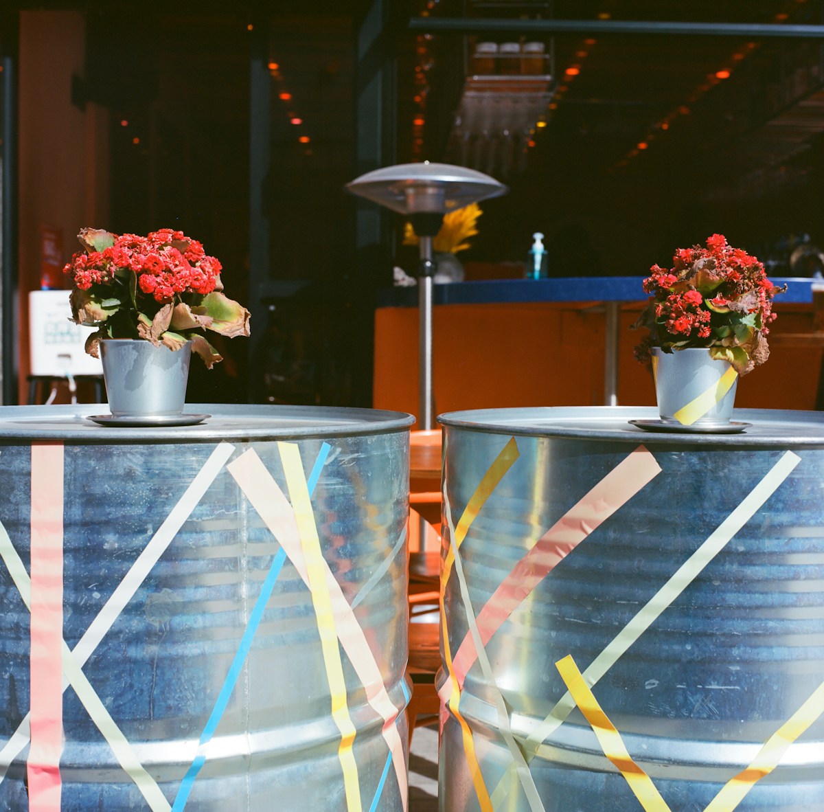 Painted keg tables in the yard
