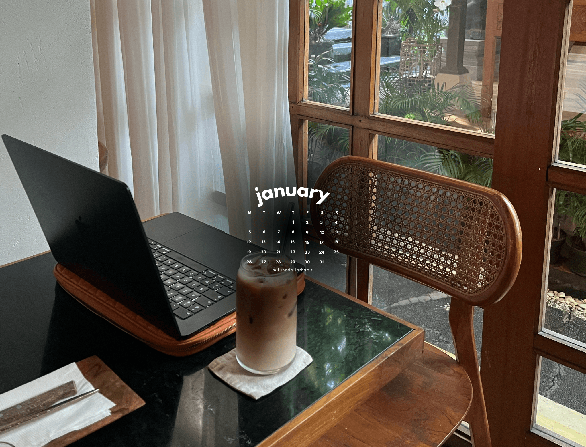 December 2025 desktop calendar wallpaper with clean typography and neutral background