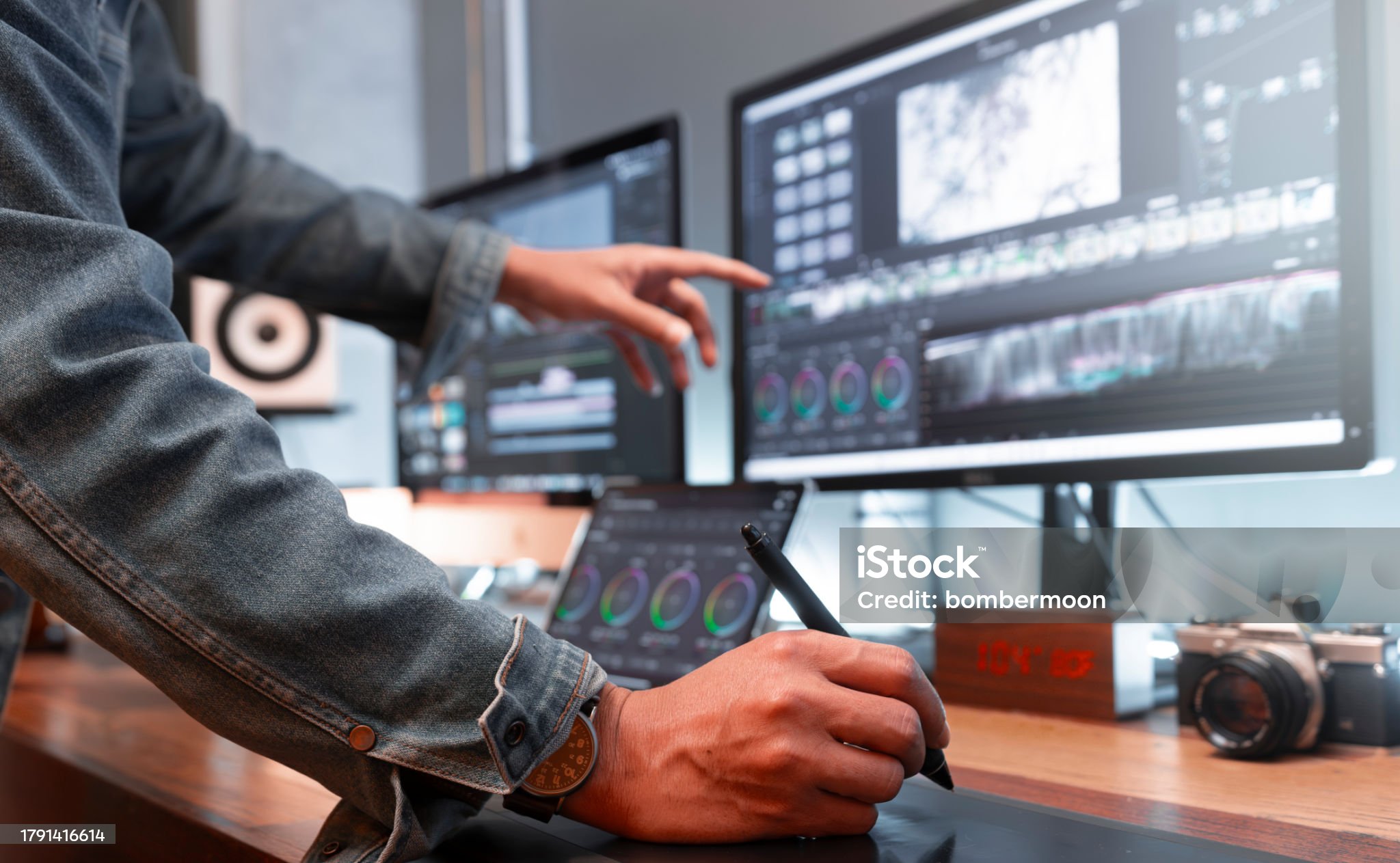 man standing near white wall