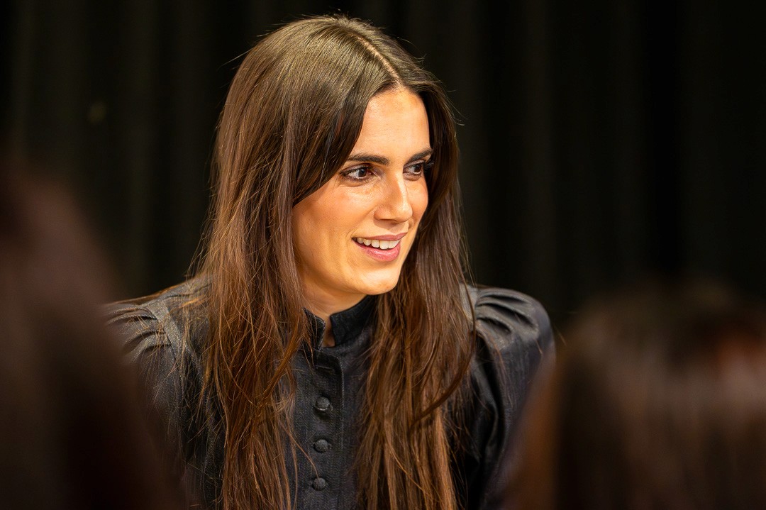 Jessica Diner speaking on stage during the launch of Diary of a Beauty Editor in London.