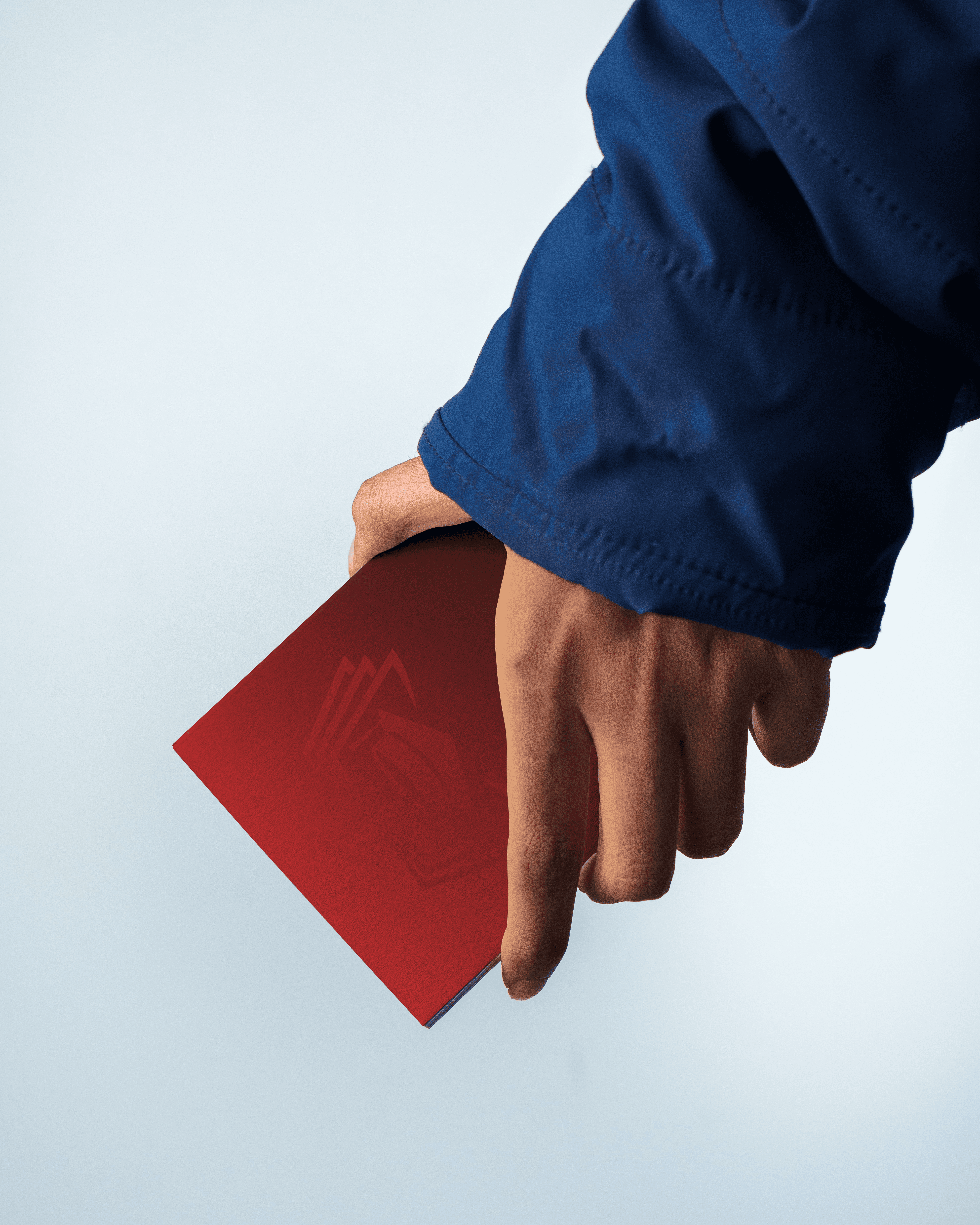image of fcls logo on a book held by a person