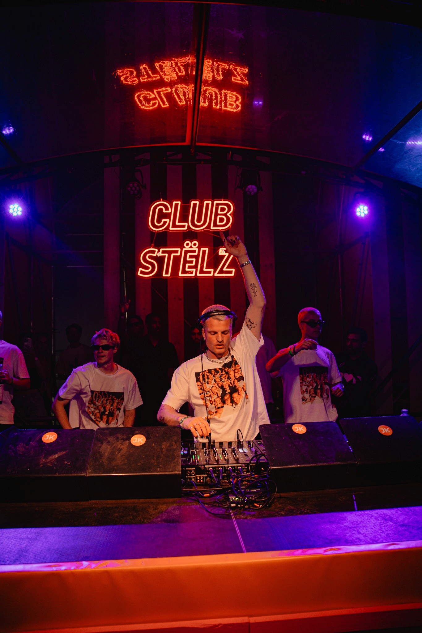 woman dancing on shoulders at music festival