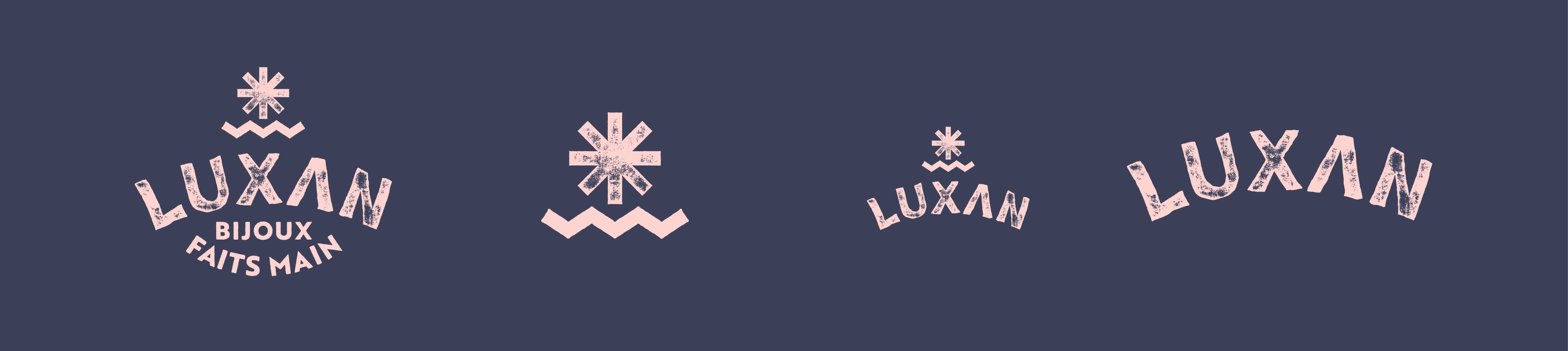 Luxan logo suite collection in light pink & navy blue.