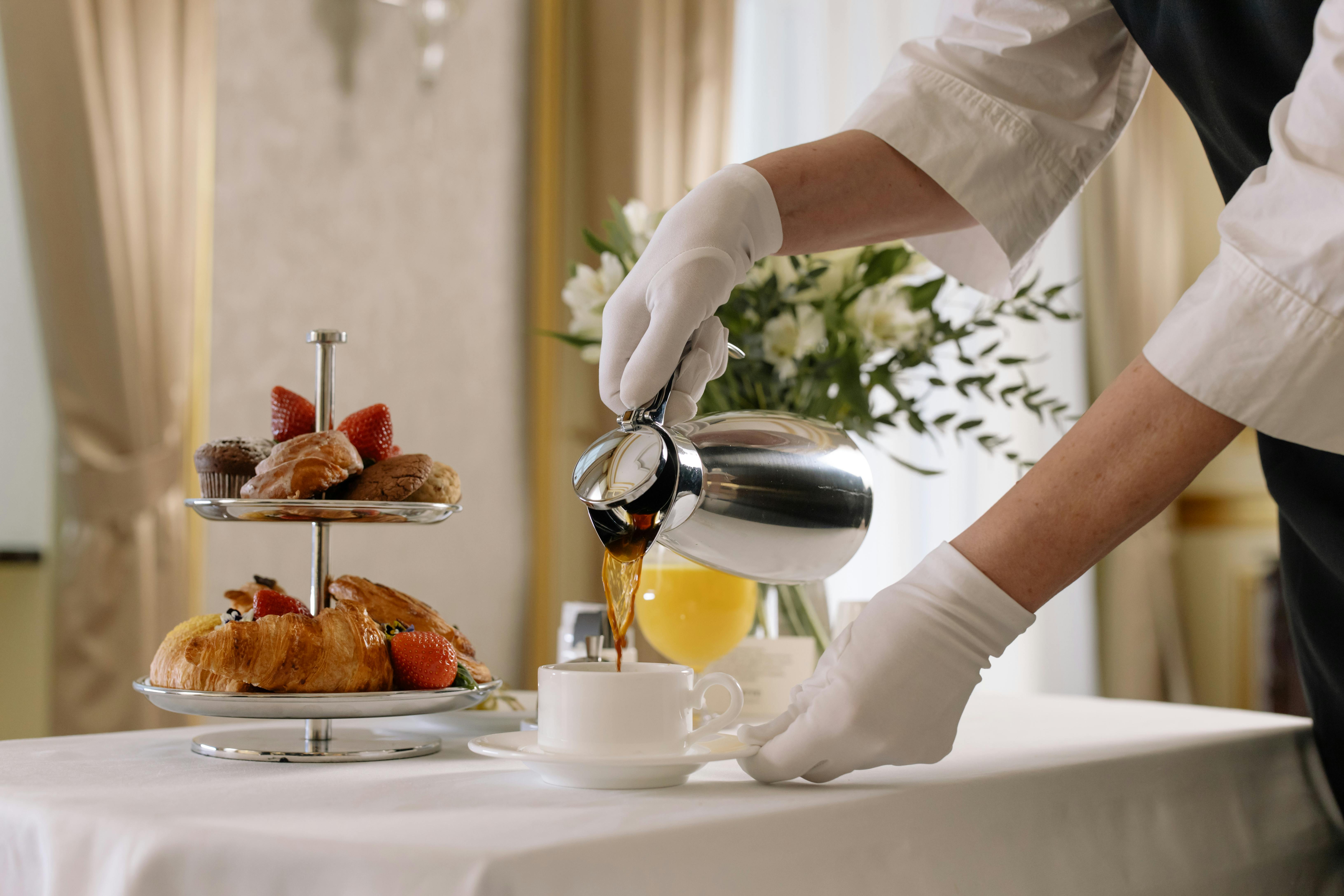 La Residencia San Miguel morning breakfast served on the garden terrace with pastries and coffee