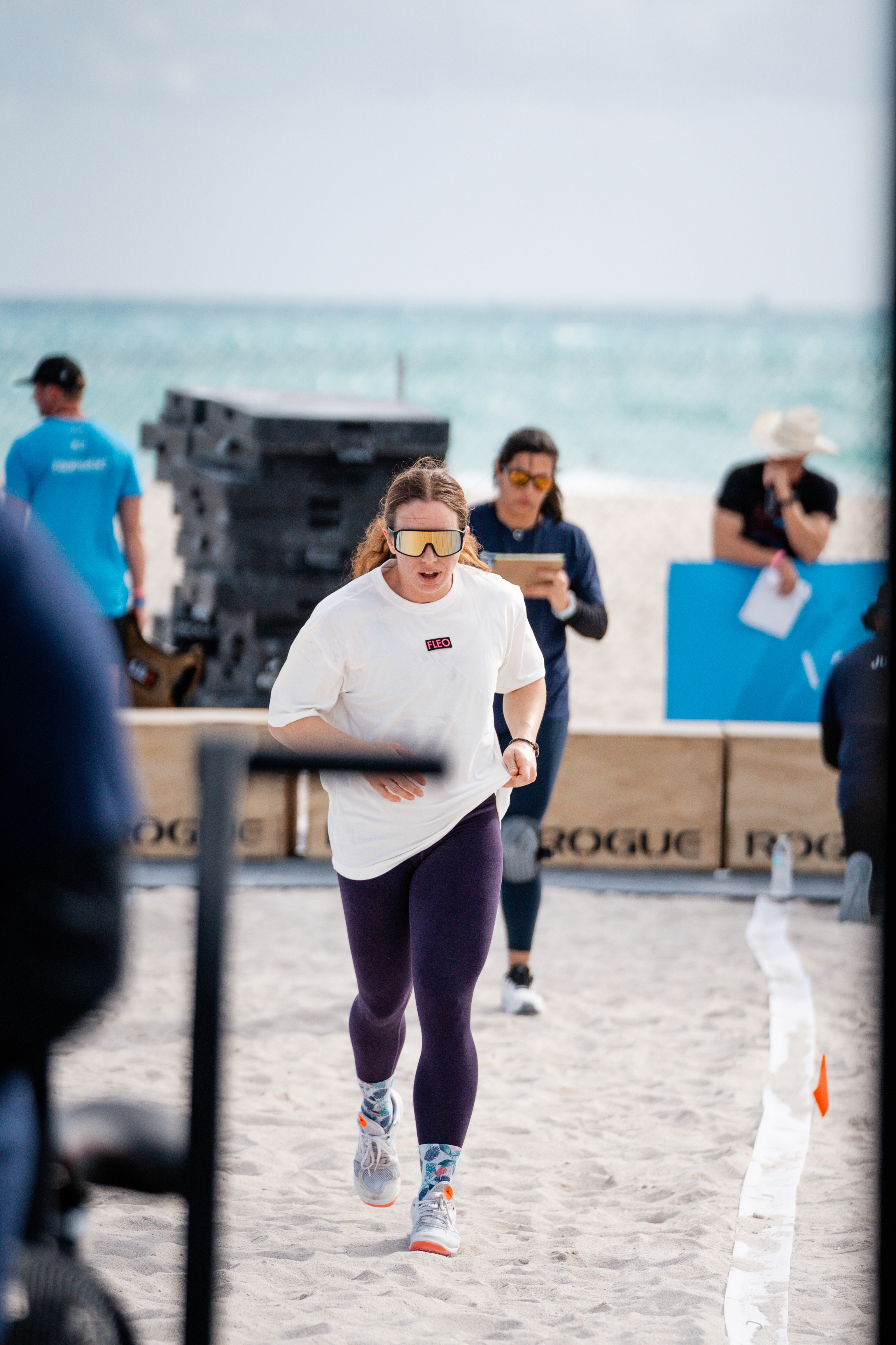 Drone shot of a running track at night