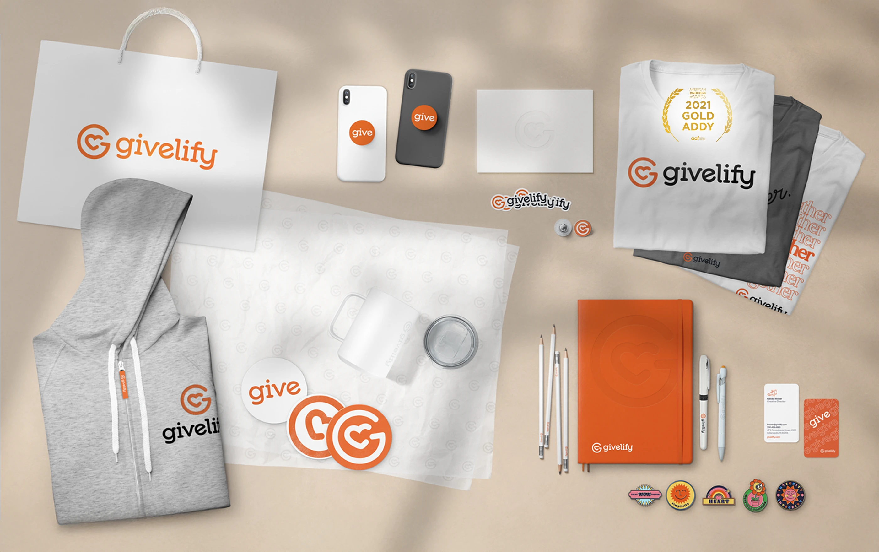 A photo showing rebranded Givelify collateral and merchandise