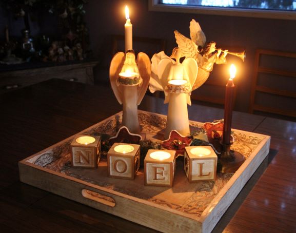 Noel blocks and Angel candles lit