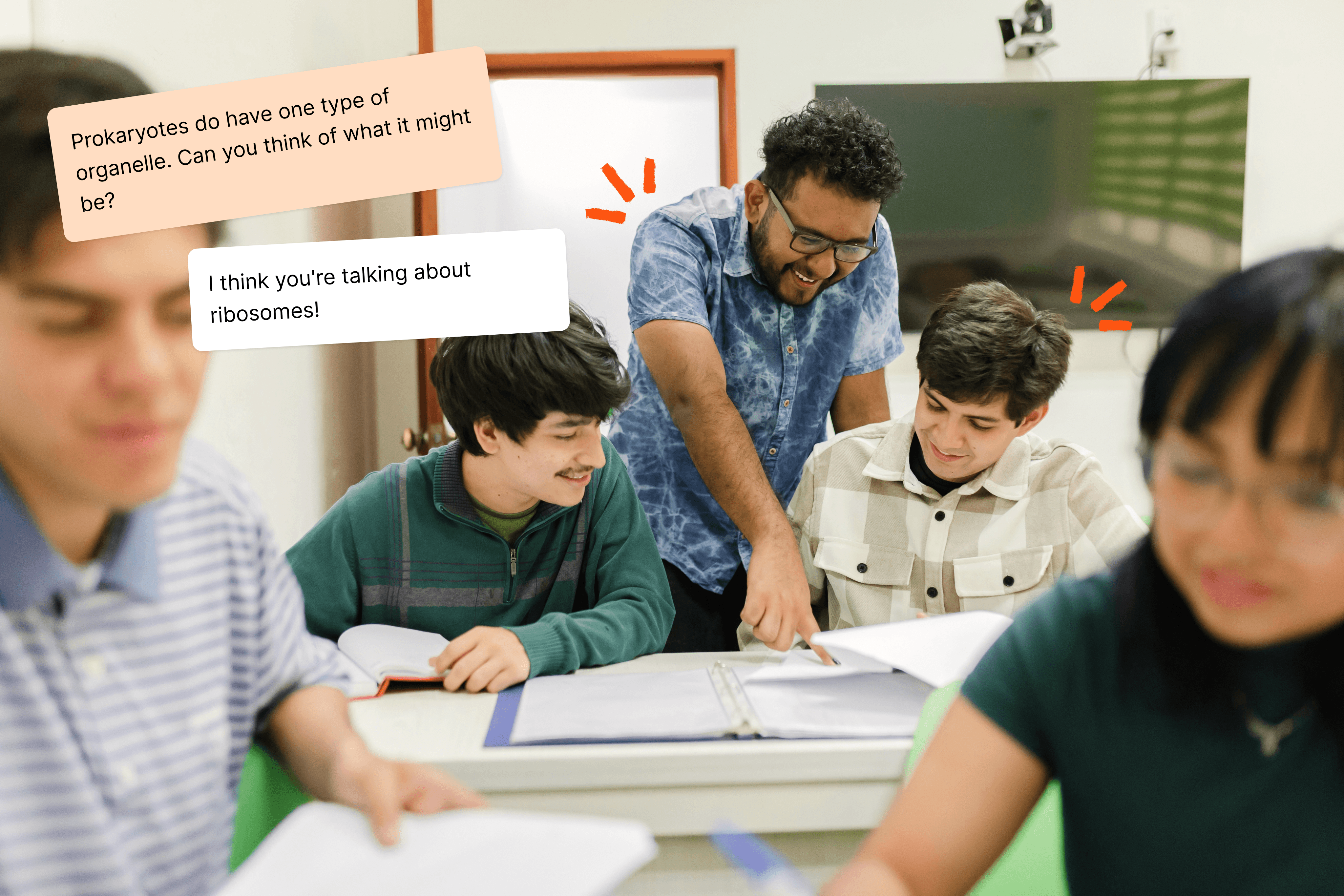 Image of teacher pointing out a problem to a student