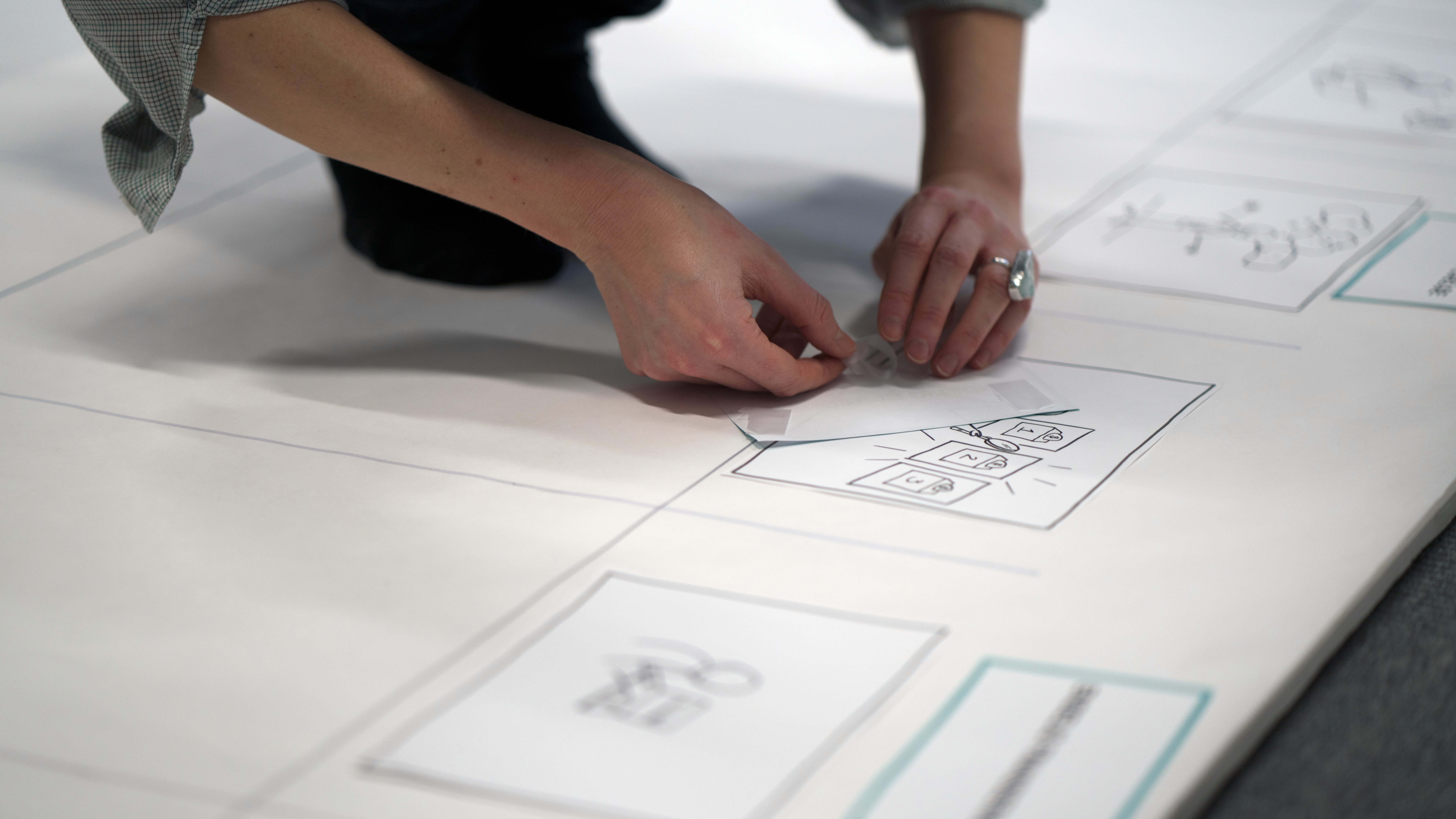 person sitting in a chair in front of a man