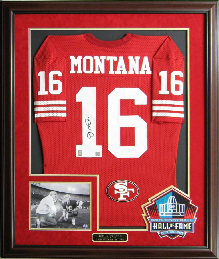 Modern living room with vertical garden, yellow sofas, and stylish coffee tables.