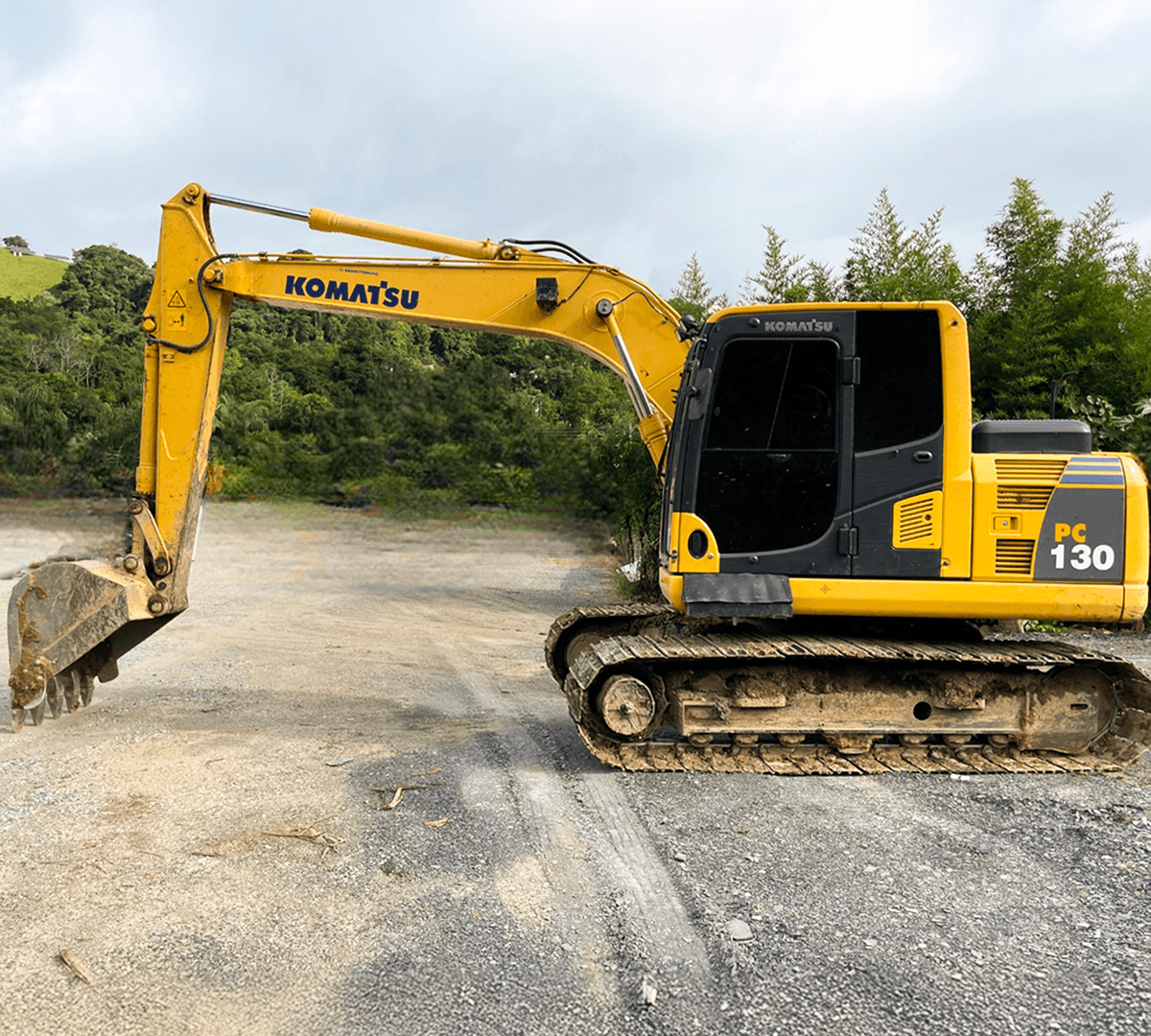 Snow-covered village lights up at dusk in mountains