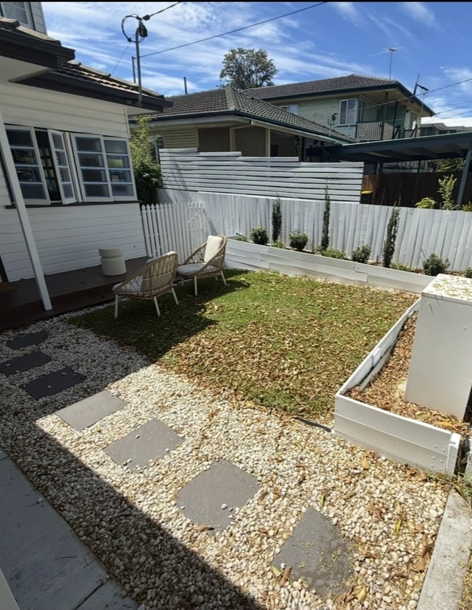 Beautiful landscaped garden with greenery and outdoor design elements.