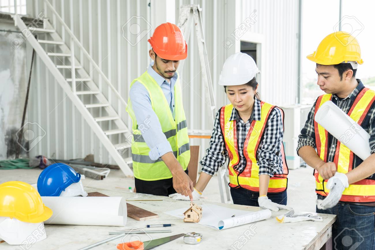 engineer reviewing blueprint site