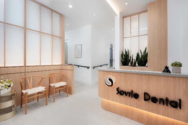 Front reception desk with Sovrle Dental logo at Sovrle Dental Clinic in North York, Ontario: the best dentist in North York, Ontario