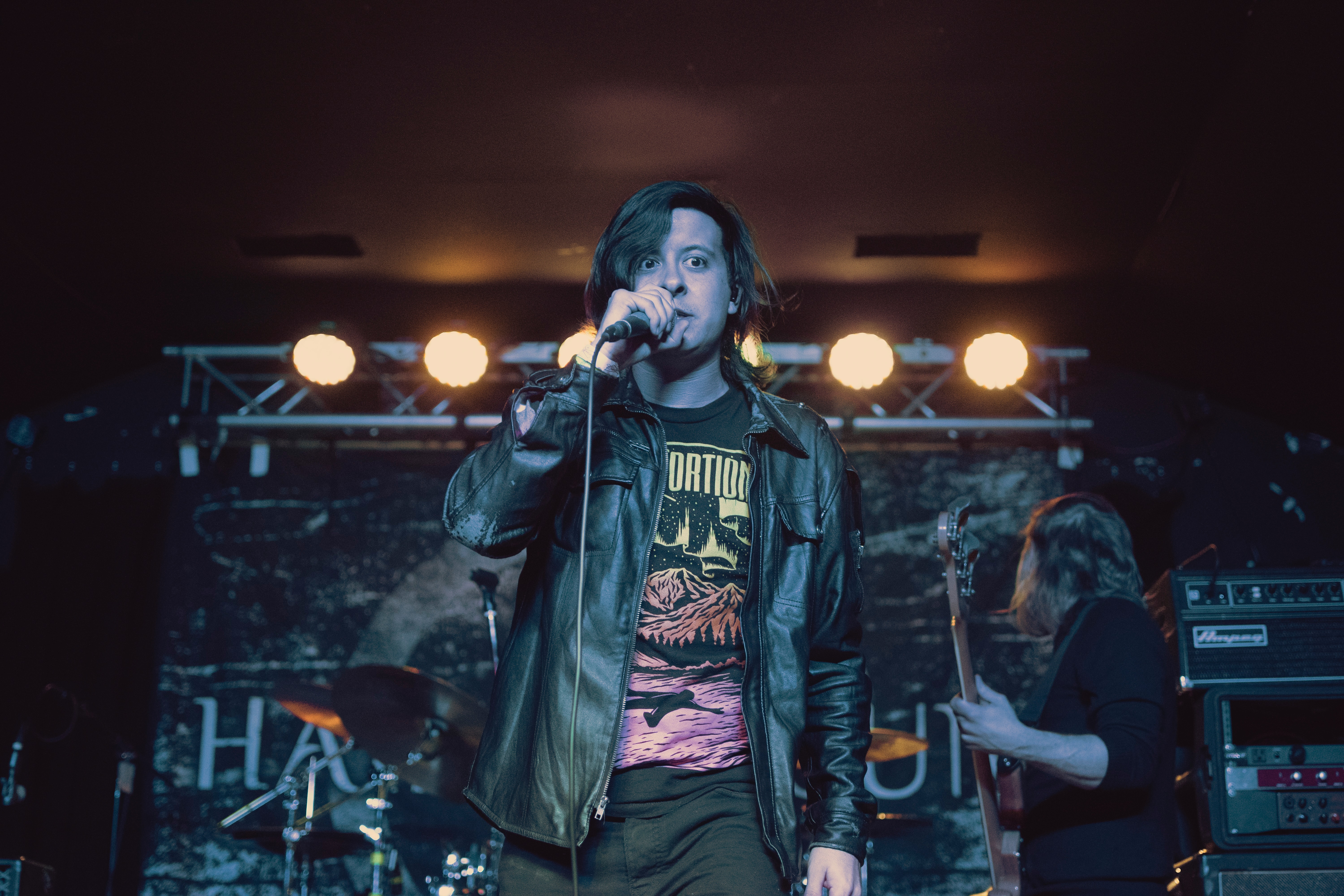 Man singing in a local concert - hire a singer