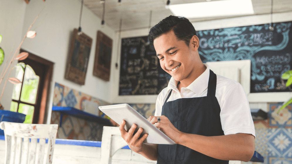 A Malaysian business owner in his restaurant