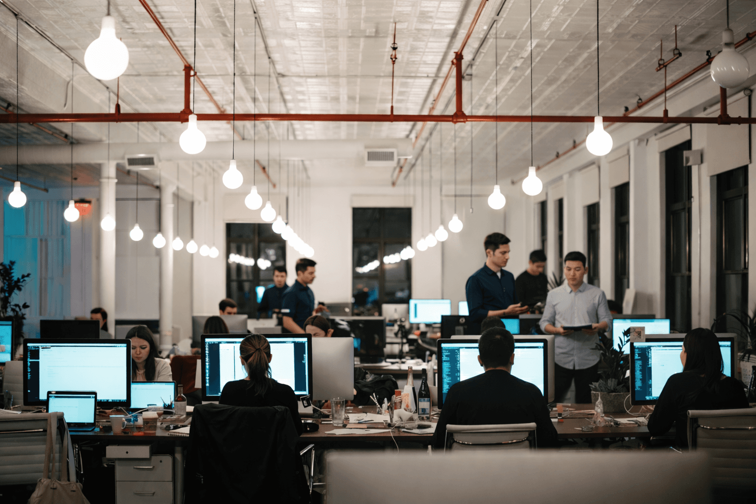 kids lying on a glass land and smiling