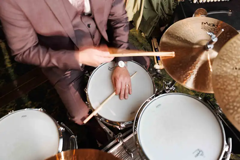 An above shot of someone playing the drums