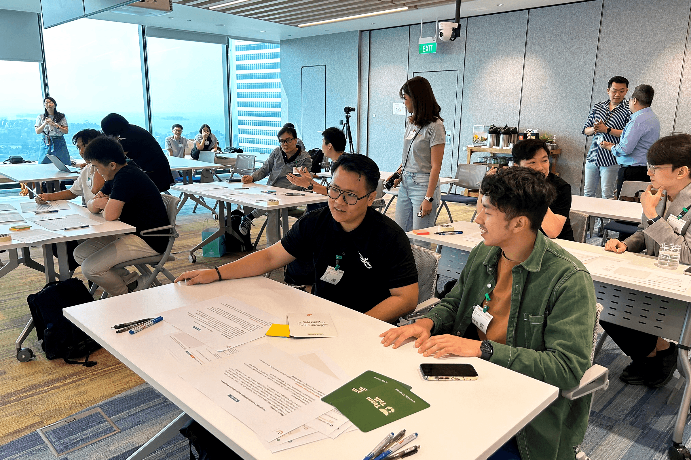 A group of startup founders participating in a design thinking workshop