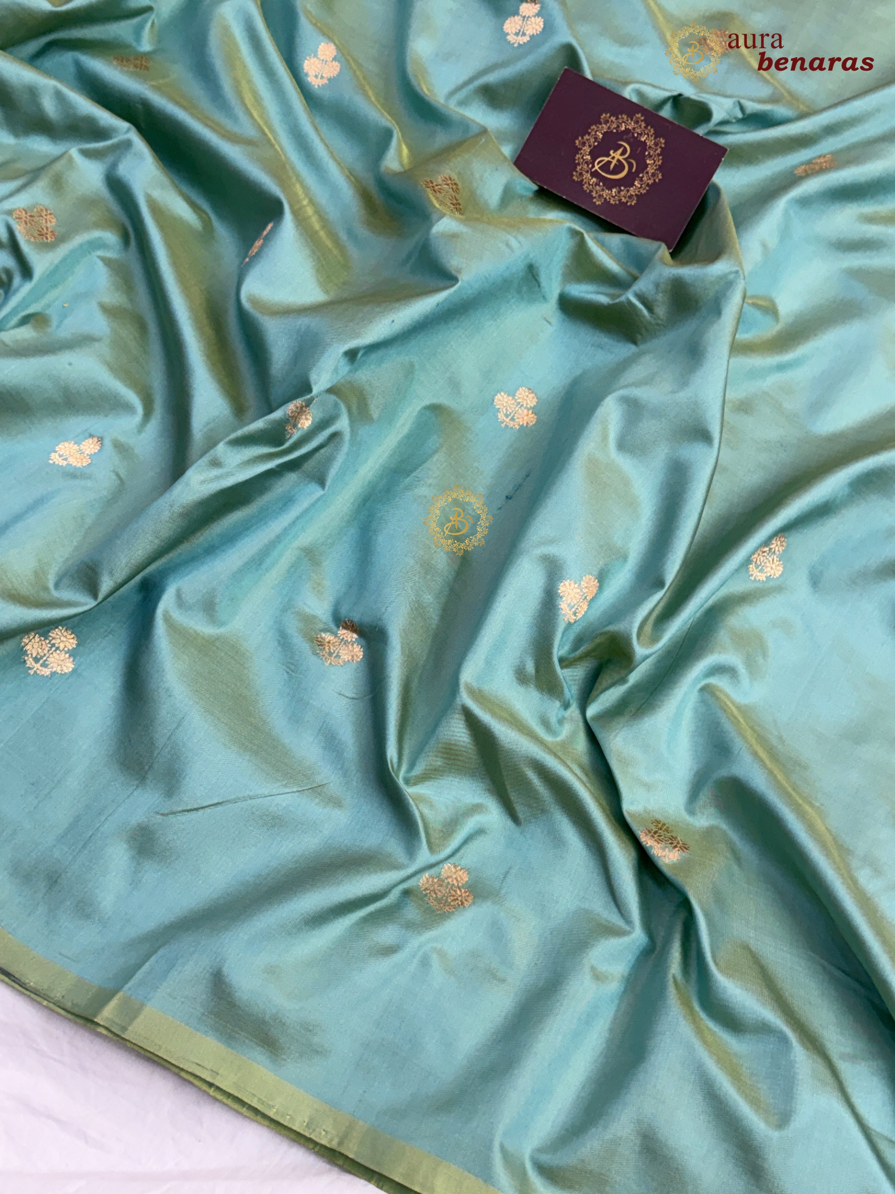 Sage green pure Banarasi handloom katan silk saree with gold zari buta by Aura Benaras, ₹11,975