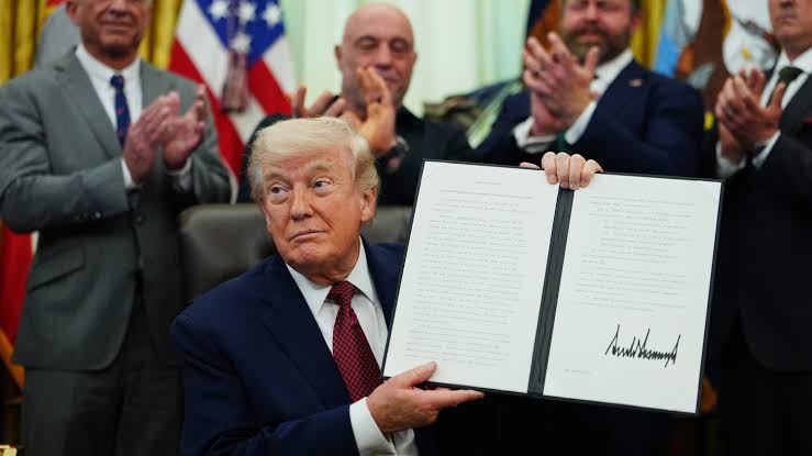 Donald Trump and administration signing executive order