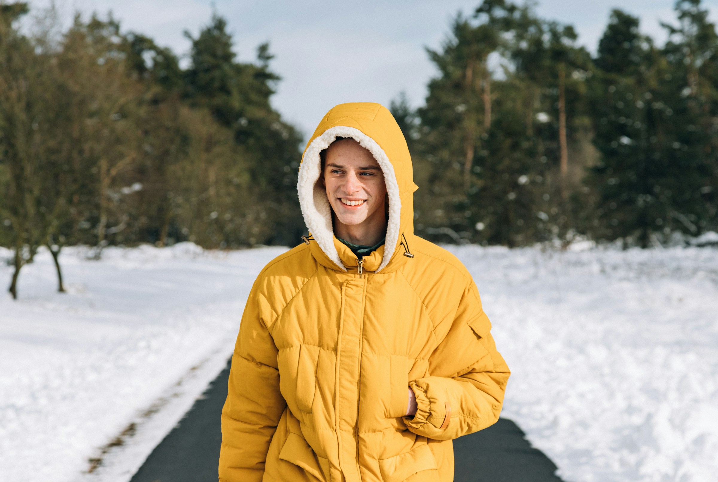 woman walking on snow - Yellow Color Combinations Clothing