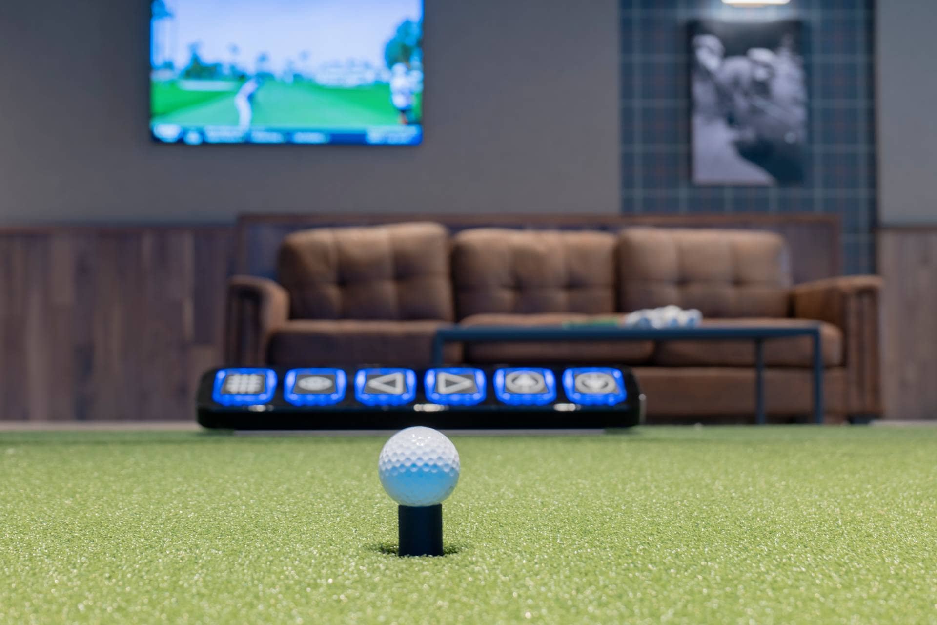 golf ball on the green of an indoor golf course