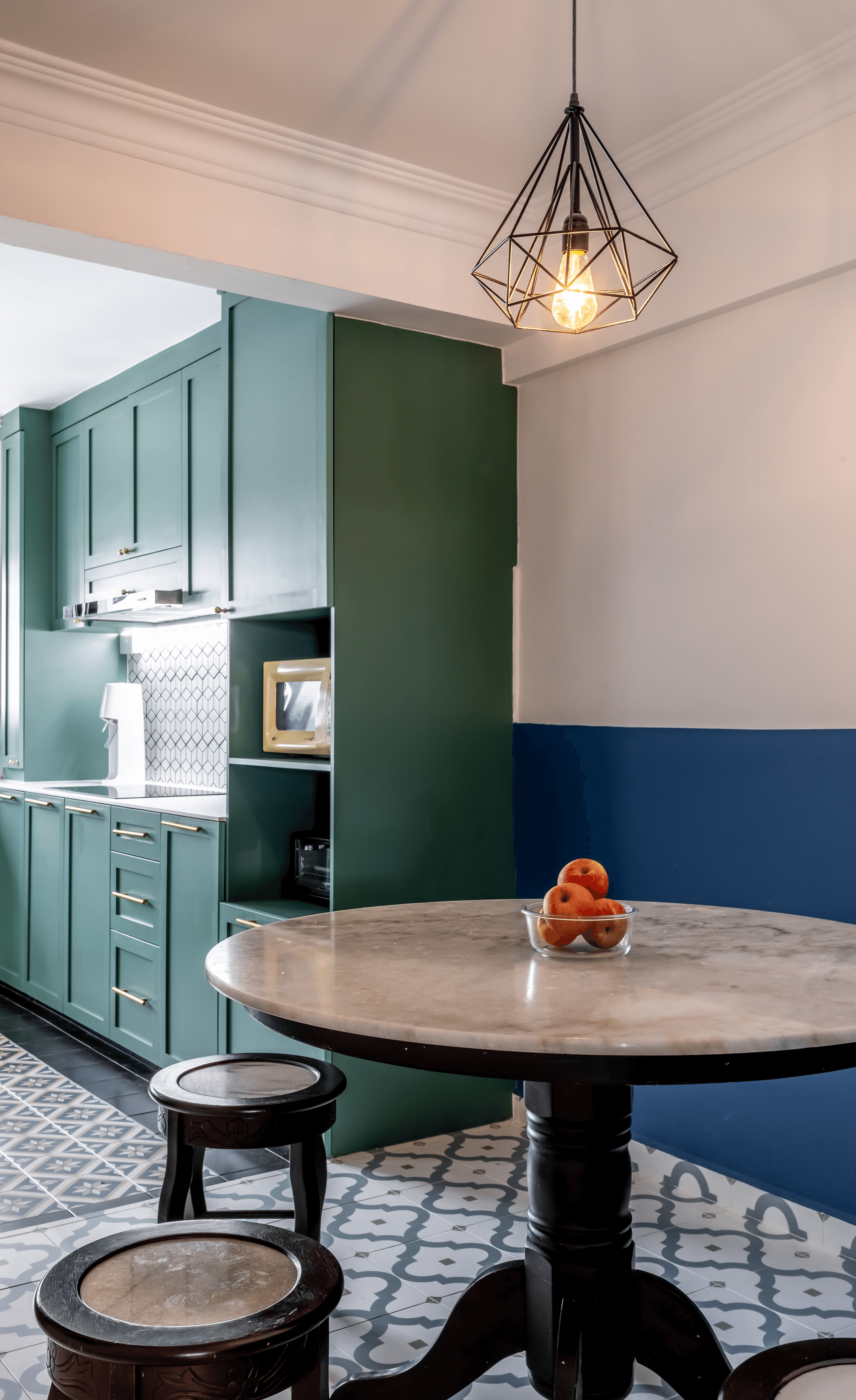 Living and dining continuity anchored by TV console and custom cabinetry.