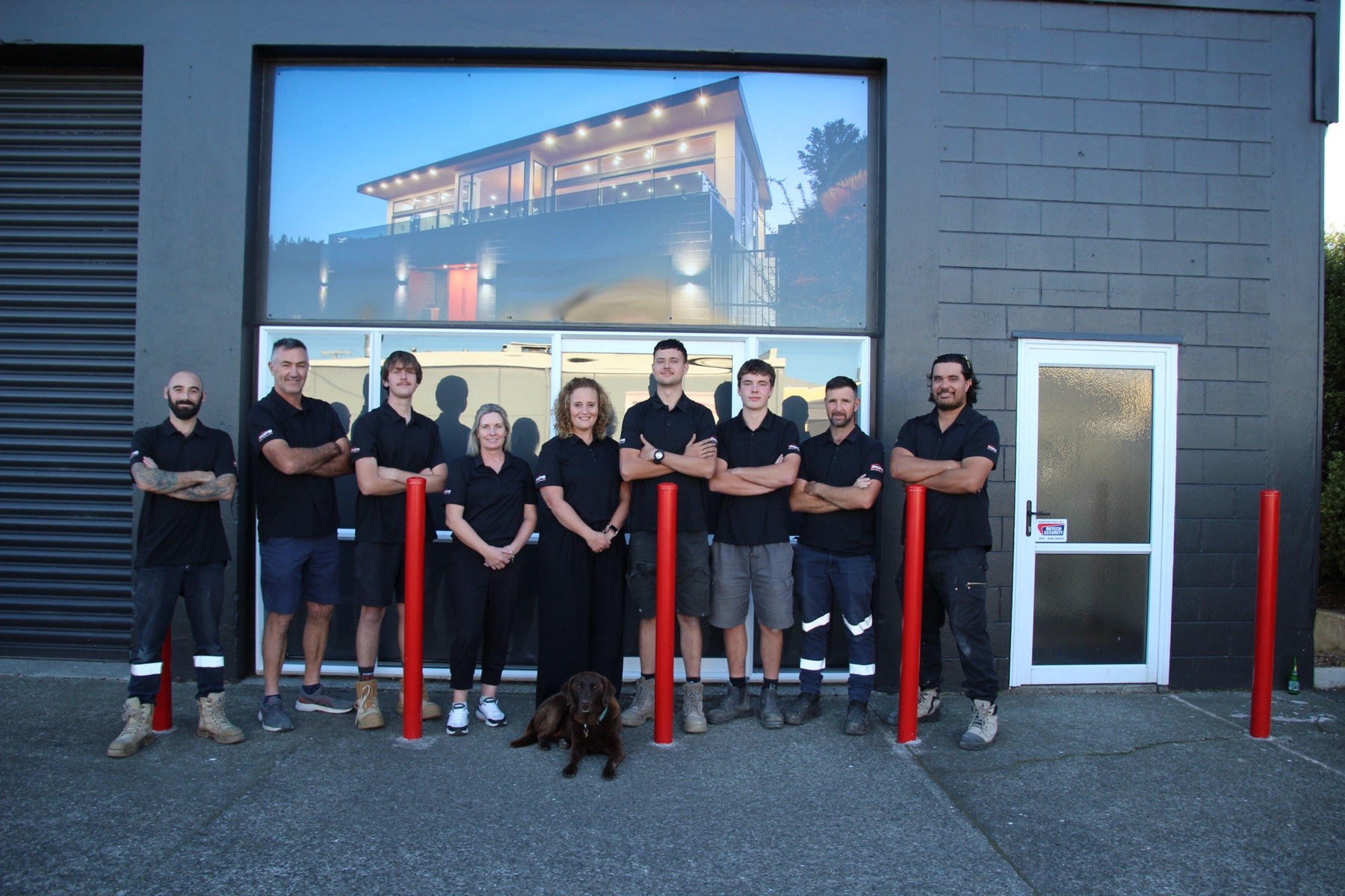 The Pope Housing and Construction team outside their Rotorua office