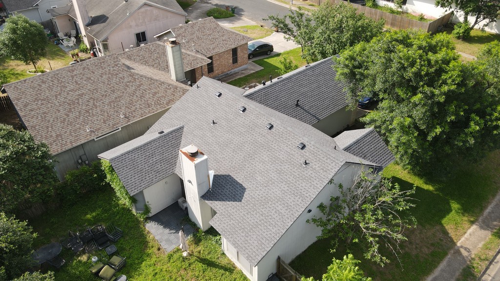 Gable roof with large dormers, slant-back vents, and a chimney, offering a classic design with efficient ventilation and added charm.