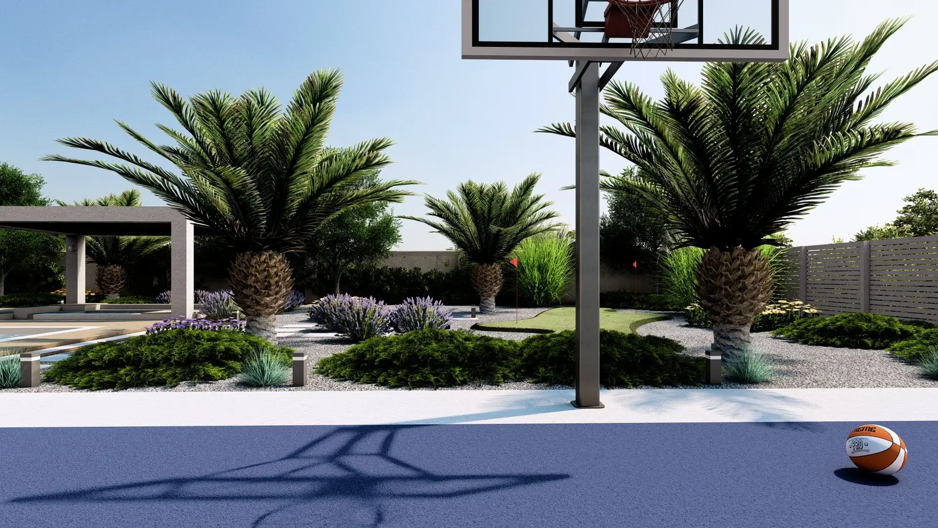 Serene outdoor garden with tall palm trees, lush shrubs, flowering plants, and modern pergola. A basketball hoop stands over a blue court. The bright sunlight casts prominent shadows of the palms on the court.