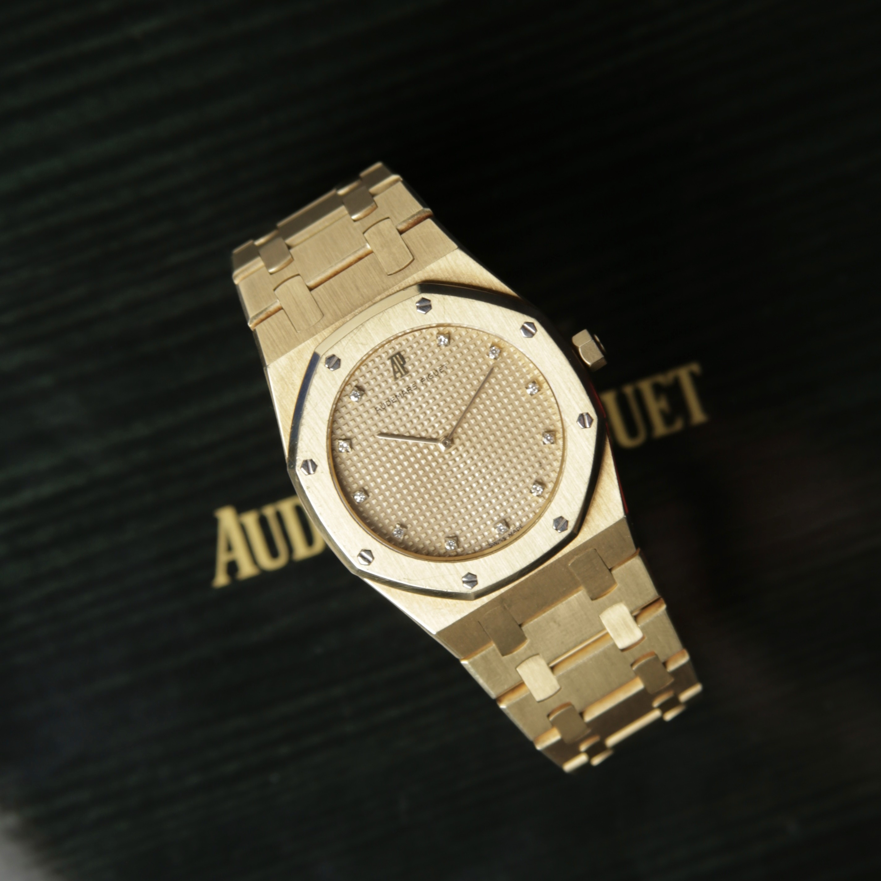 Classic silver luxury watch on dark background