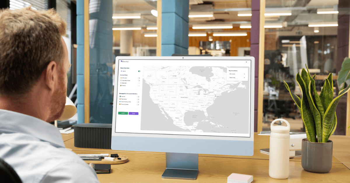 man sitting at computer looking at dorothy platform