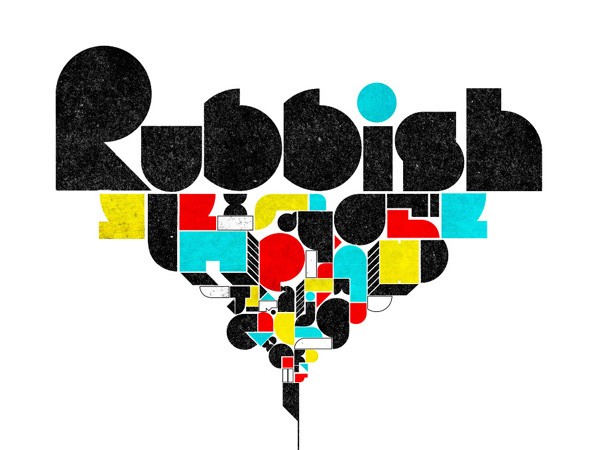 The image shows the word "Rubbish" written in large, bold, black letters against a white background. The letters are stylized and composed of smaller geometric shapes in red, yellow, blue, and black colors. The design is abstract and does not form any recognizable words or phrases.