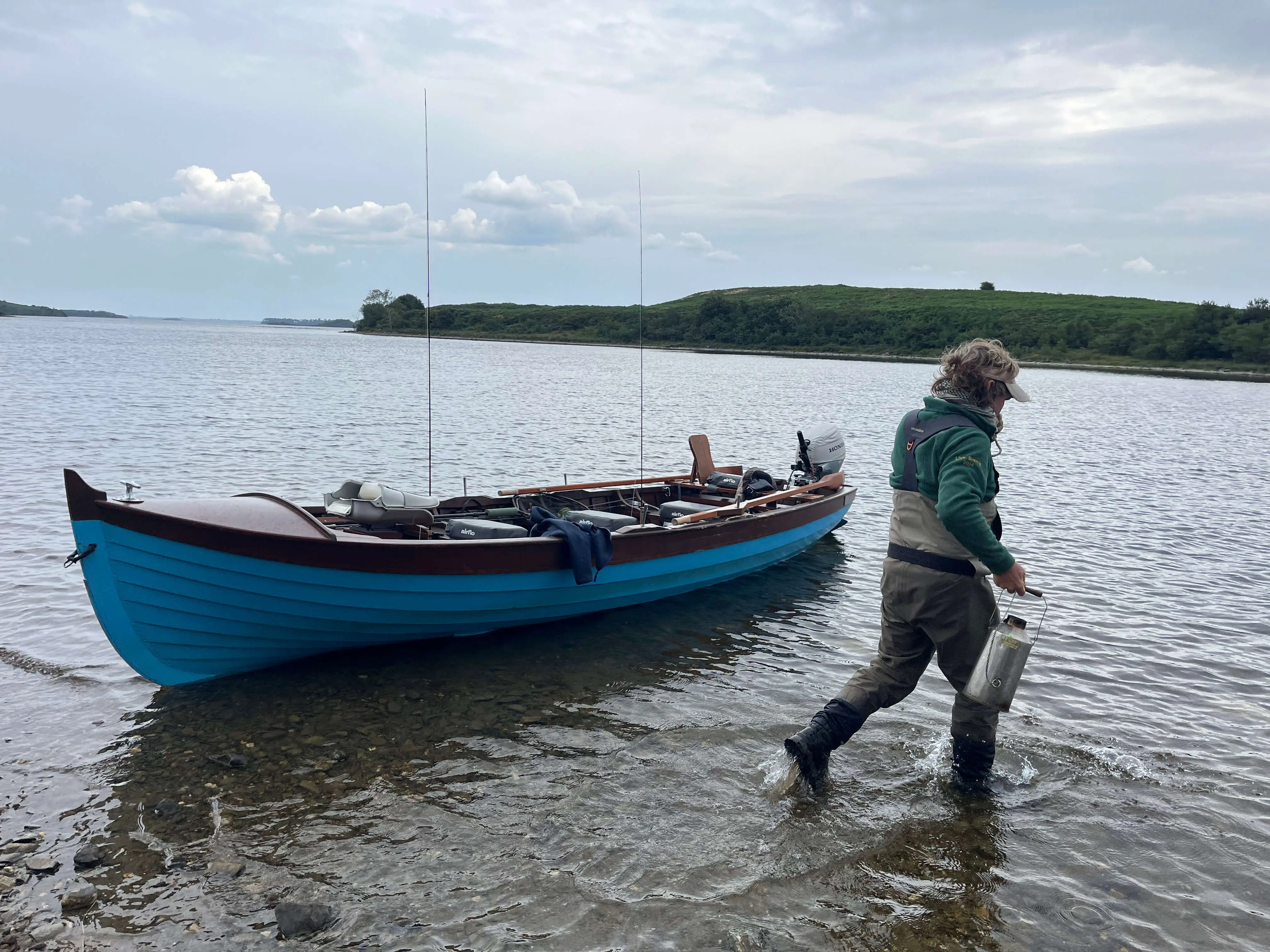 Traditional wooden lough boat drifting on Lough Corrib, Connemara, Ireland