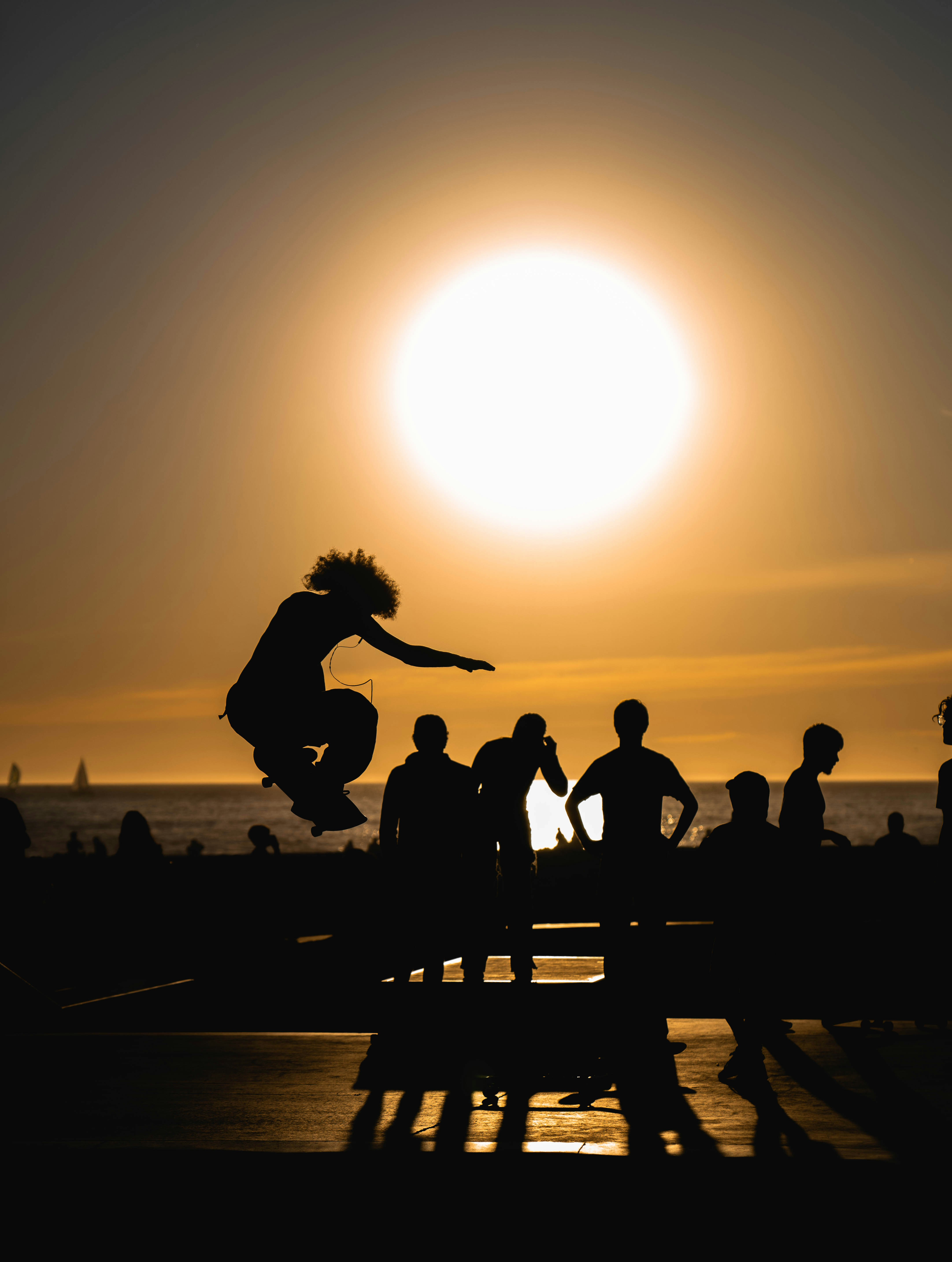 a person jumping a skate board in the air