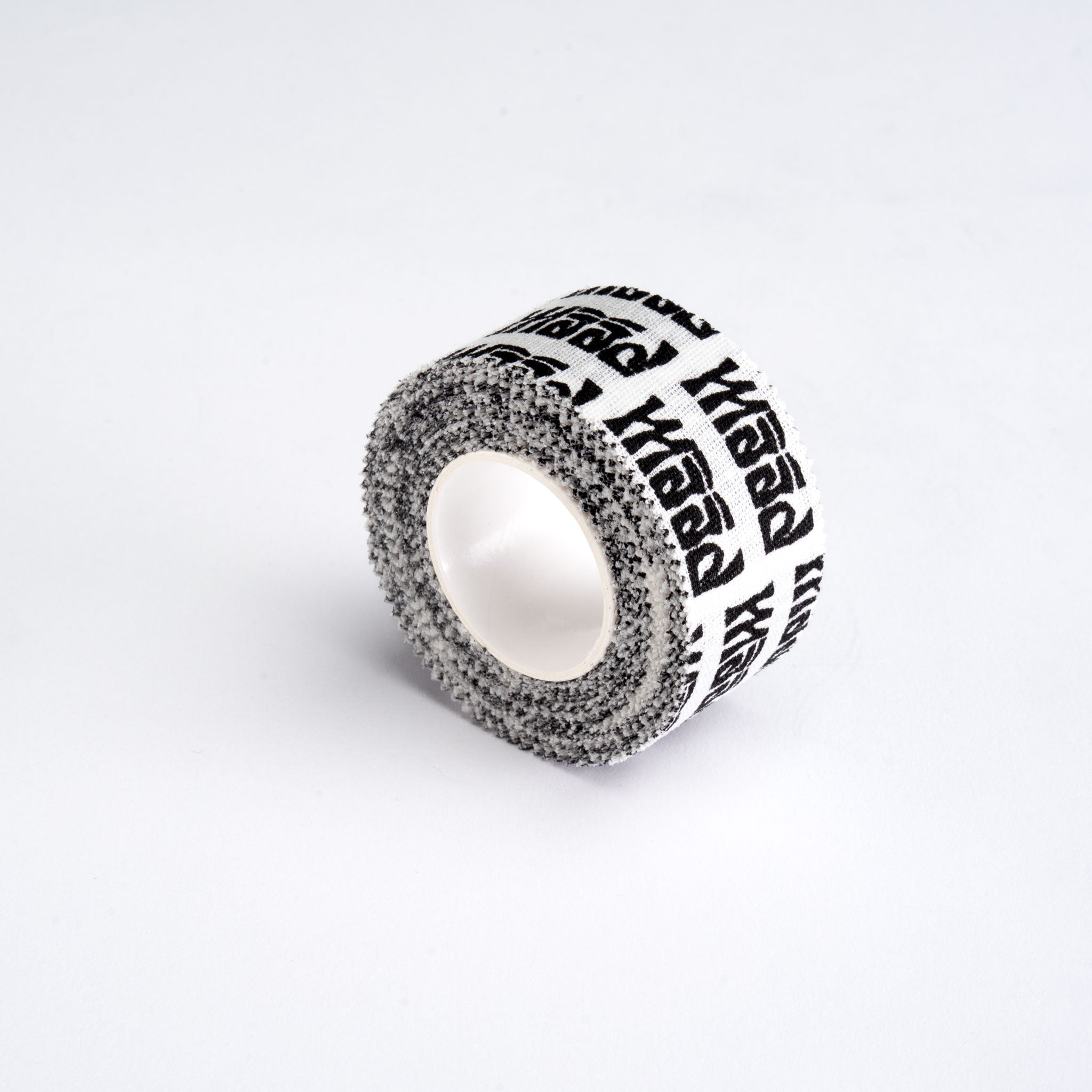 Roll of tape with text on a white background