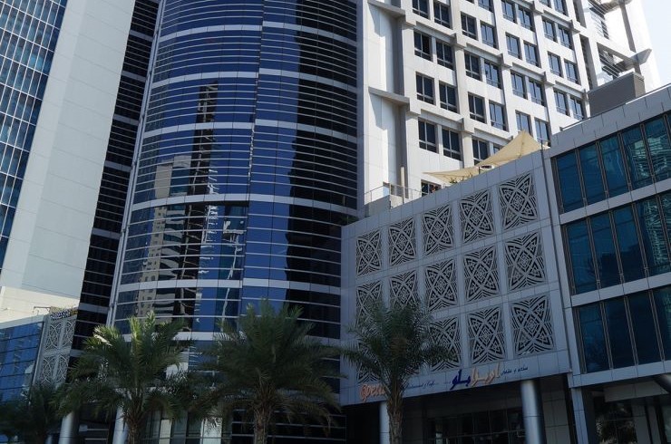 Modern architectural facade of Silver Tower, offering premium office spaces for rent through our agency.