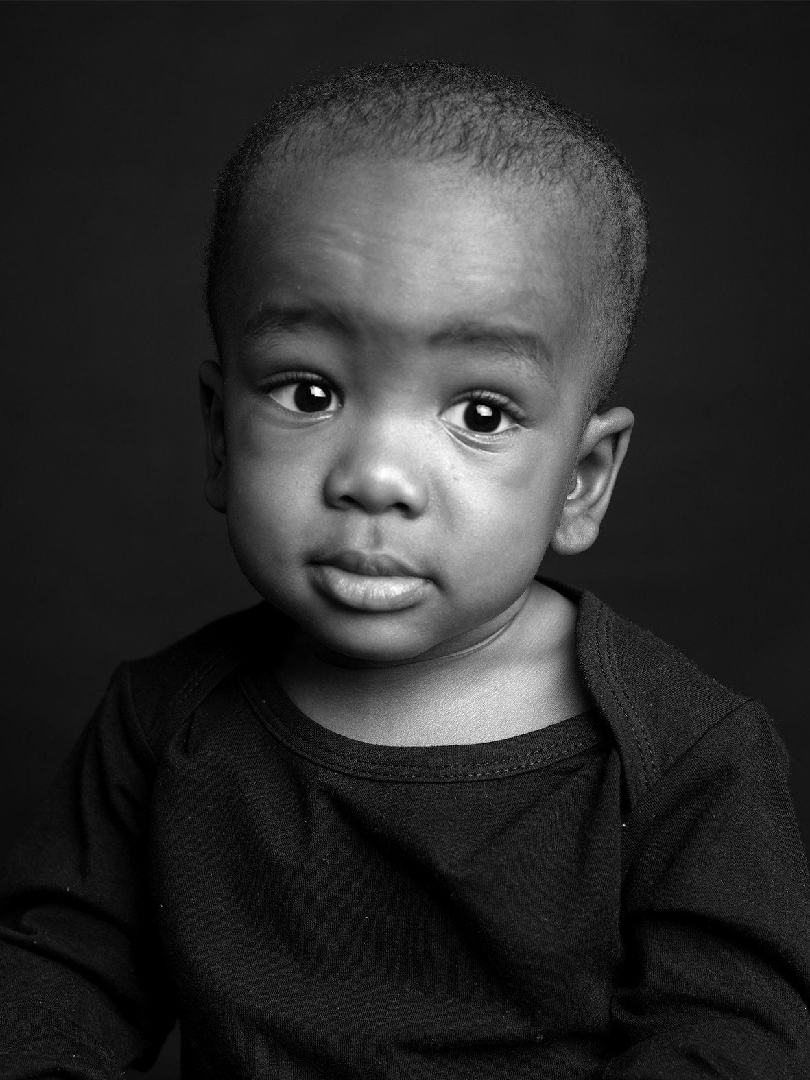 Portretfoto van een jongen in Studio Hester, Amsterdam
