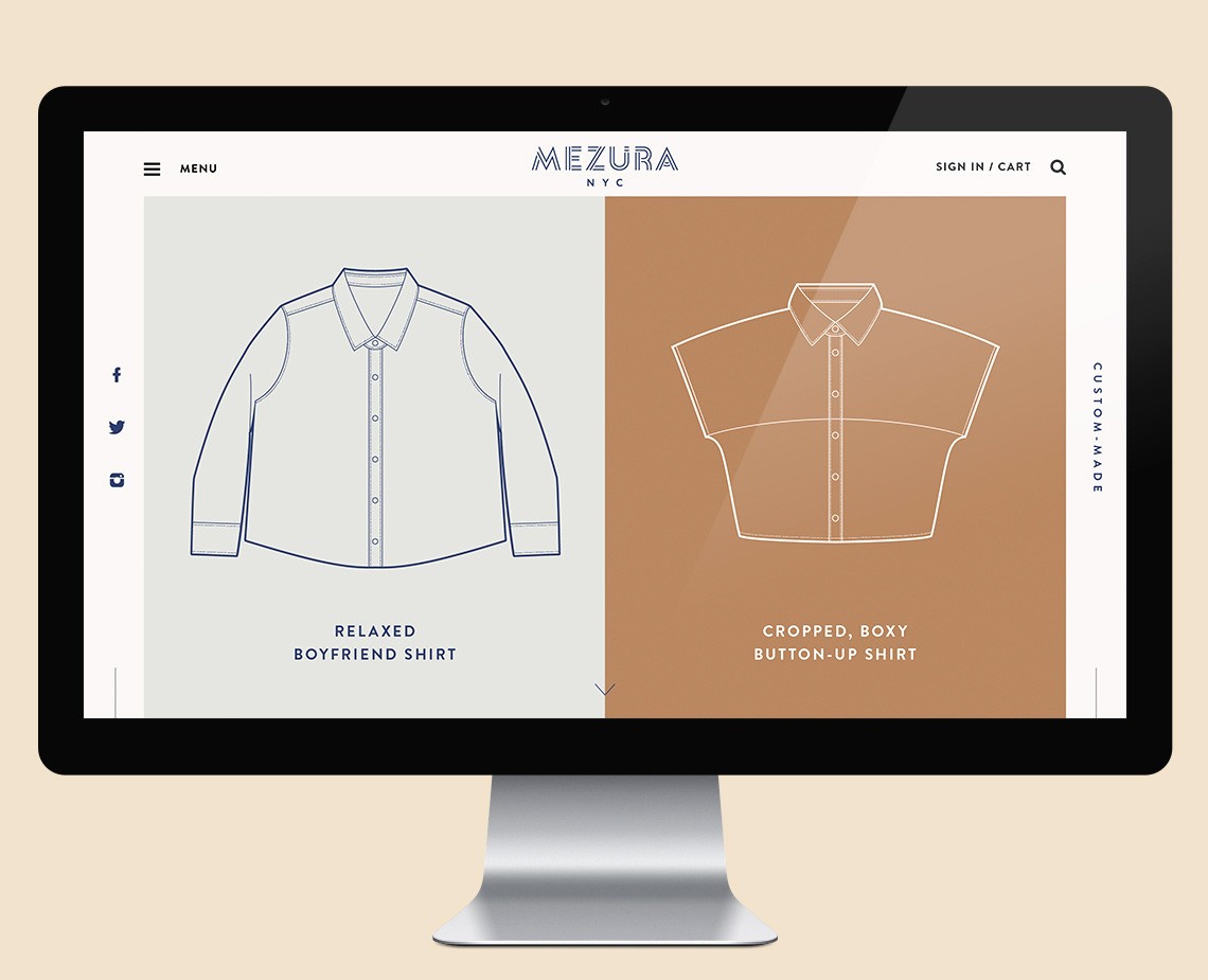 A computer monitor displays a Mezura NYC website. The left side shows a light blue relaxed boyfriend shirt. The right side shows a cropped, boxy button-up shirt in brown. Both shirts are line drawings with minimal details. Navigation menus are visible at the top and bottom.